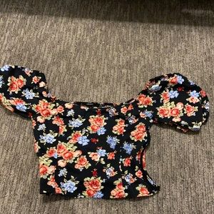 This is a beautiful puff off the shoulder top.